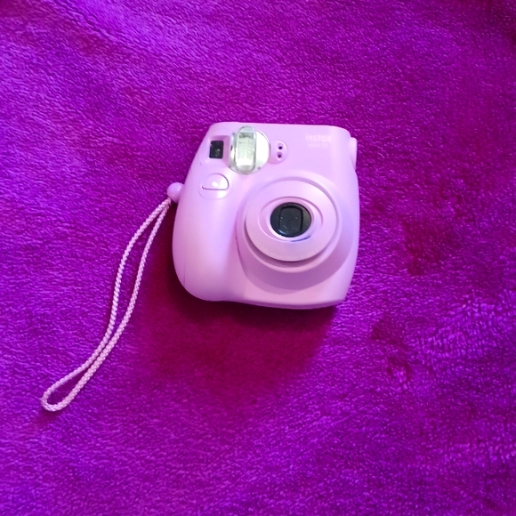 Instax mini 7S camera plus a free instax mini instant film